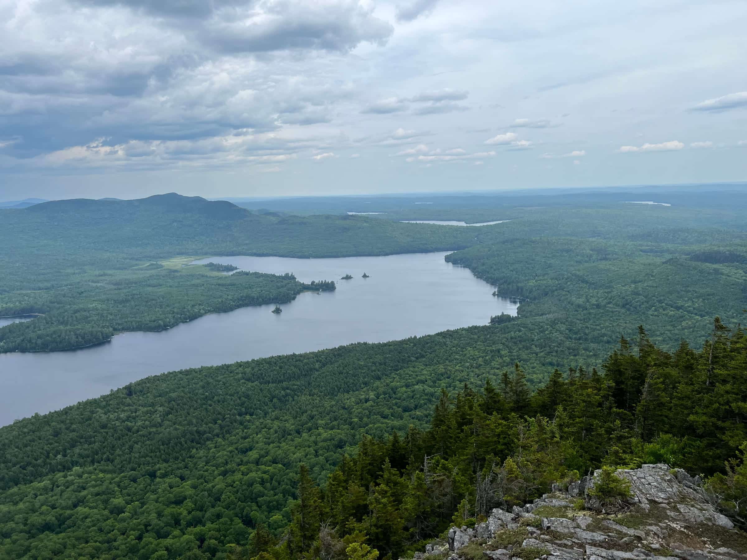 Private hunting land: a remote lake ringed by timbered ridges